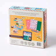 Creative DIY kids activity with paints, stickers, and rocks