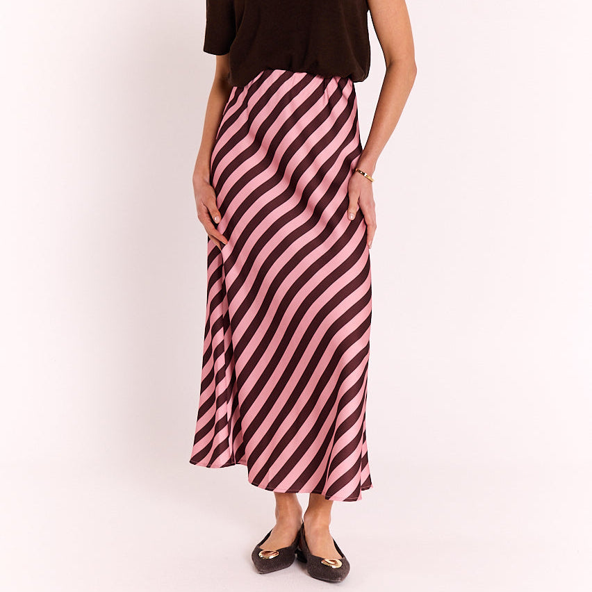Feather & Noise Lucy slip skirt in rose stripe worn by a model