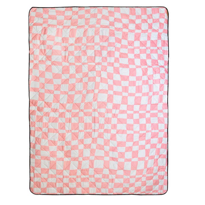 Isla picnic rug by IZIMINI rolled with carry strap