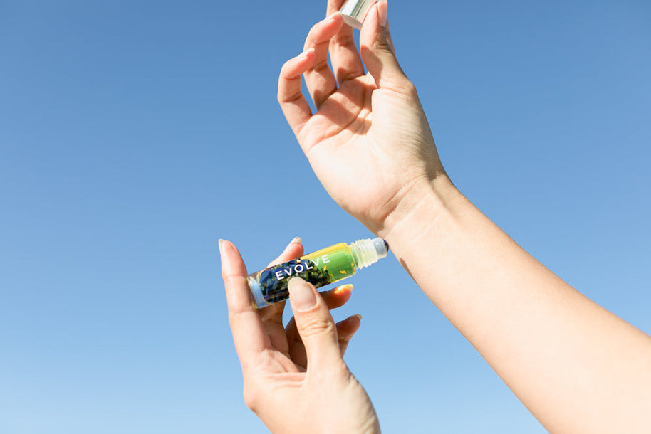 Orange, lavender and rose essential oil roller for transformation