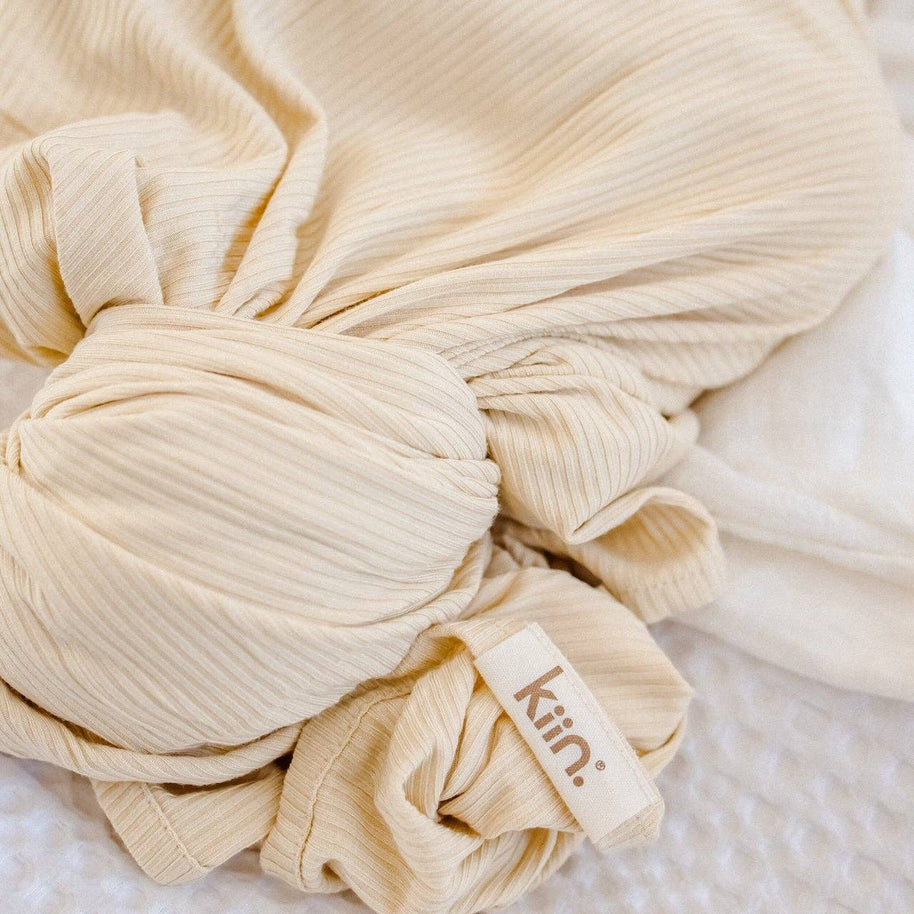 Baby swaddle in oat ribbed bamboo fabric