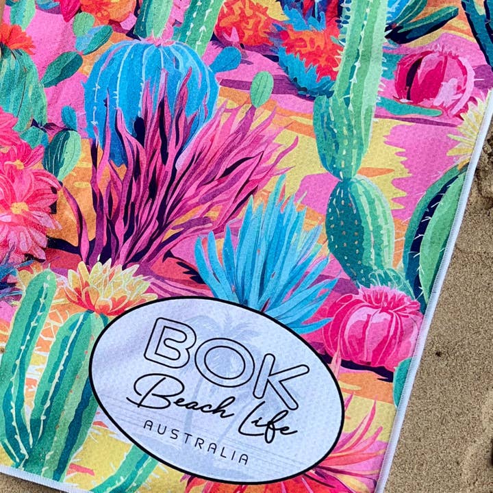 Reversible waffle weave beach towel with carry bag