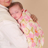Organic cotton and bamboo muslin swaddle with blush pink floral print