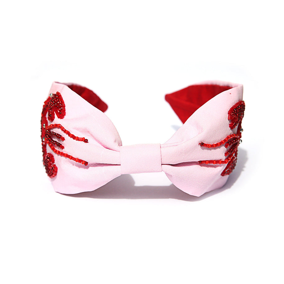 Vibrant red and pink beaded headband designed in Australia by Jemima Kingston