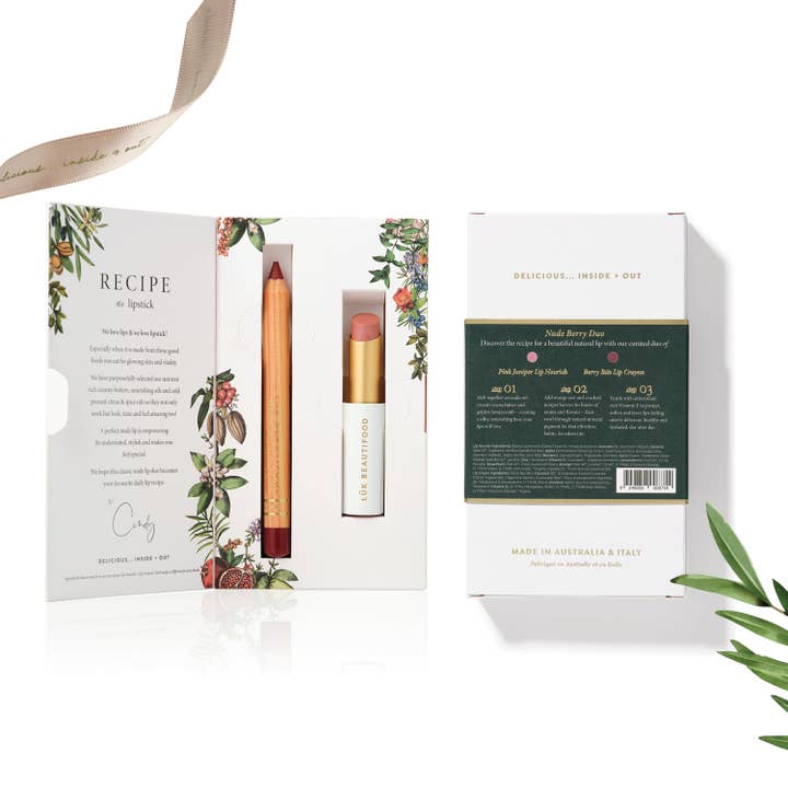 Pink Juniper Lip Nourish and Berry Bite Lipstick Crayon in festive book-style box