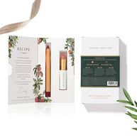 Pink Juniper Lip Nourish and Berry Bite Lipstick Crayon in festive book-style box