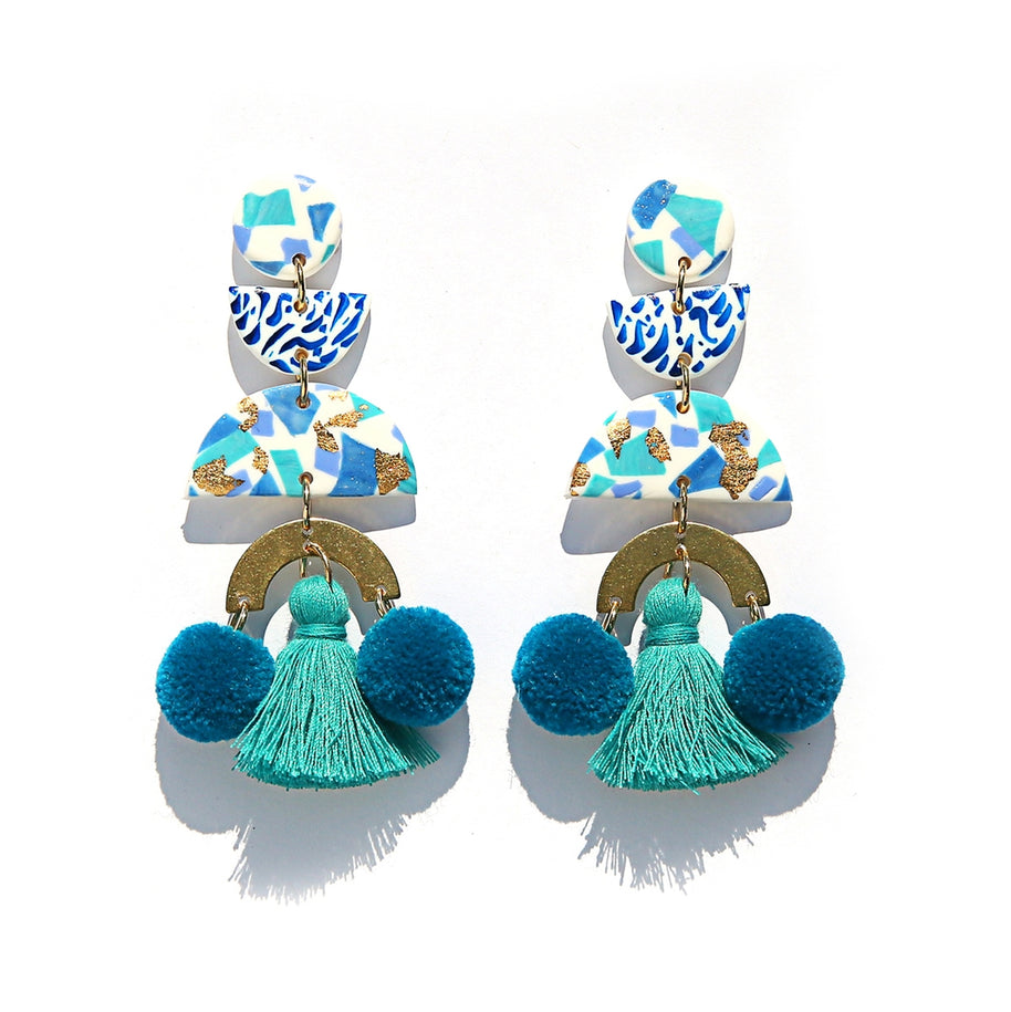 Bold handmade statement earrings in blue terrazzo design with pom poms
