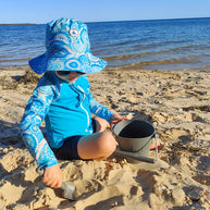 Little E & Co reversible swim hat Called Home to The Ocean Indigenous Blue
