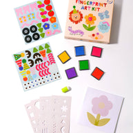 Kids craft kit contents: ink pads, stencils, stickers and finger stamp tool