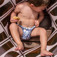 Reusable baby swim nappy with mesh lining and adjustable drawstring