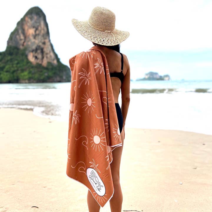 Reversible waffle weave sand free towel with matching carry bag