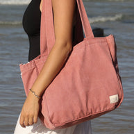 Array Everyday Pocket Tote Blush carried on shoulder