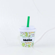 BBcino Sip-A-Saurus Babycino Cup 120ml with white silicone lid and lavender silicone band