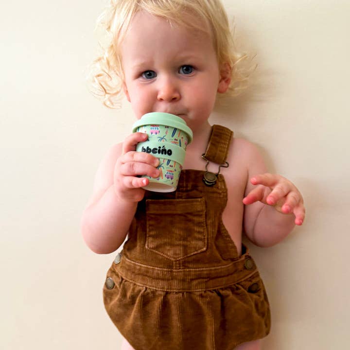 BPA-free toddler babycino cup with spill-resistant lid and straw