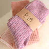 Bed and Butter The Comfiest Socks Knee High Heather Rose cashmere wool socks folded with branded band