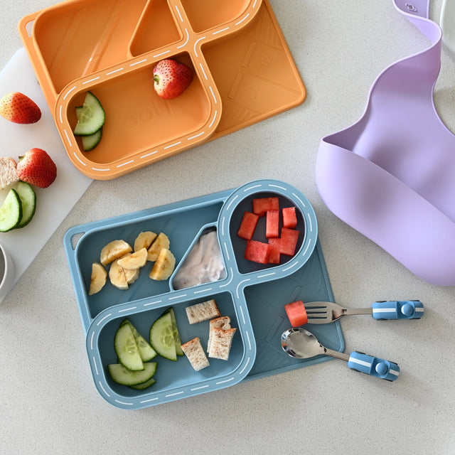 Children’s blue racetrack plate with car-shaped fork and spoon