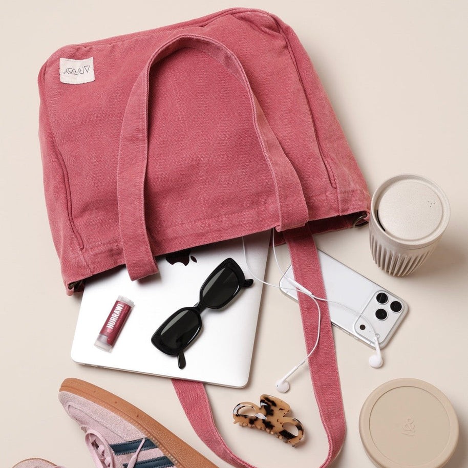 Blush tote bag with six internal organising pockets