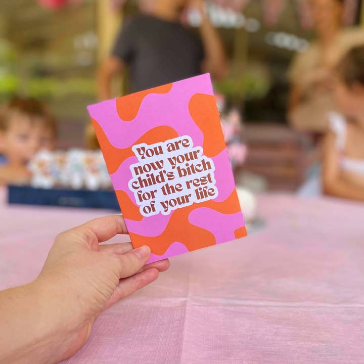 Bold pink and orange swirl pattern parenting card