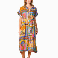 Model wearing the Kaena Dress in Multi Print with collared neckline, button front, short sleeves and optional belt.