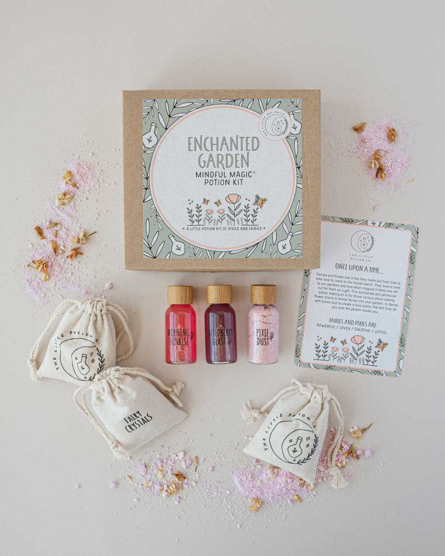 he Little Potion Co Enchanted Garden Mindful Potion Kit with fairy-themed ingredients and spell cards