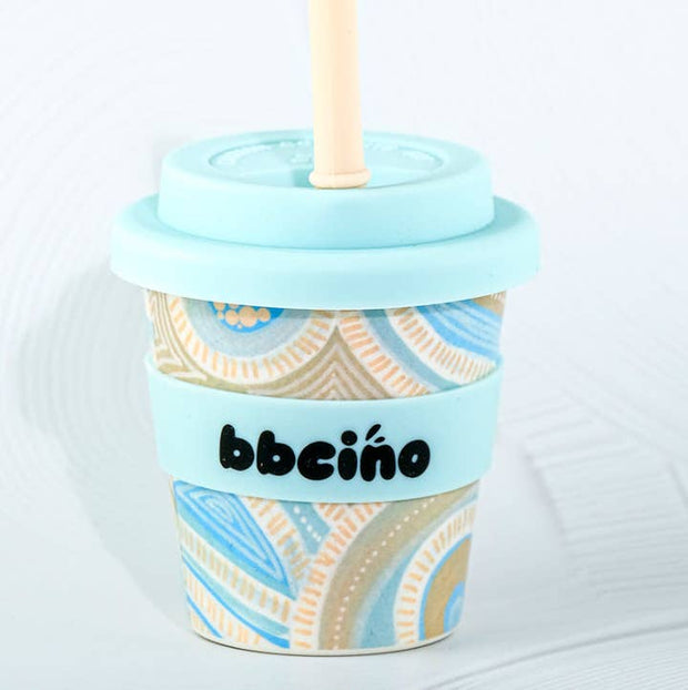 Eco-friendly bamboo kids cup featuring Merindah-Gunya Indigenous coastal artwork in blue and sand tones