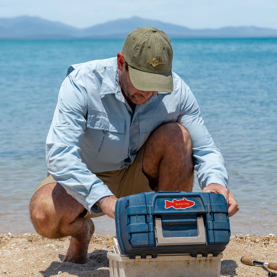 Embroidered dusky flathead fish detail on khaki dad cap