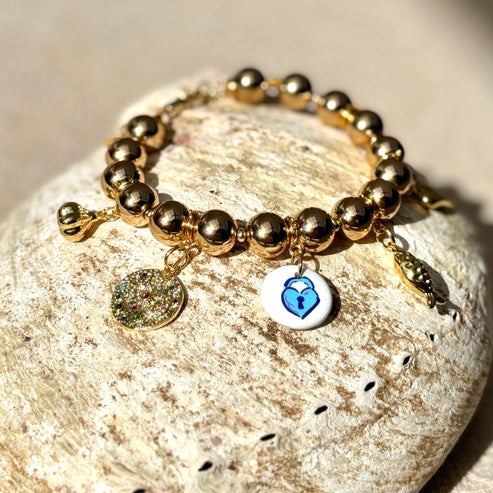 Grounding and playful charm bracelet by Boss+me