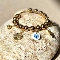 Grounding and playful charm bracelet by Boss+me