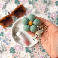Hand-felted wool flower keychain with gold clip