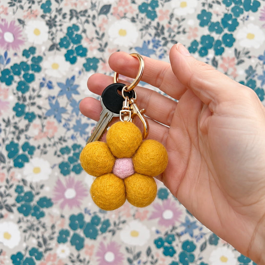 Hand-felted wool flower keychain with gold clip