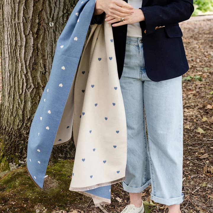 Holly Heart Scarf styled in blue tone with delicate cream hearts