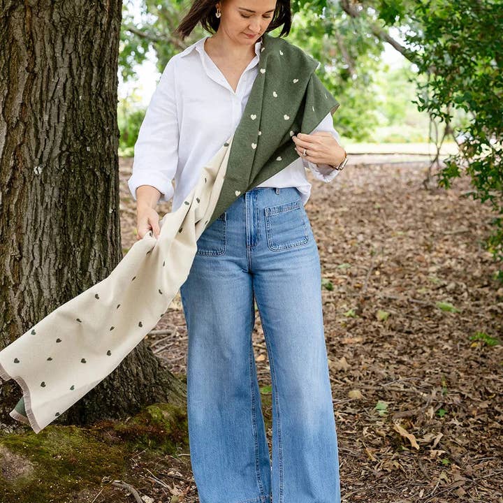 Holly Heart Scarf styled in earthy olive with delicate cream hearts