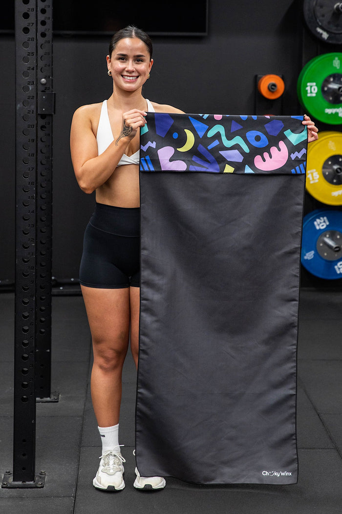 Cheeky Winx quick dry hooded workout towel with vibrant fiesta pattern