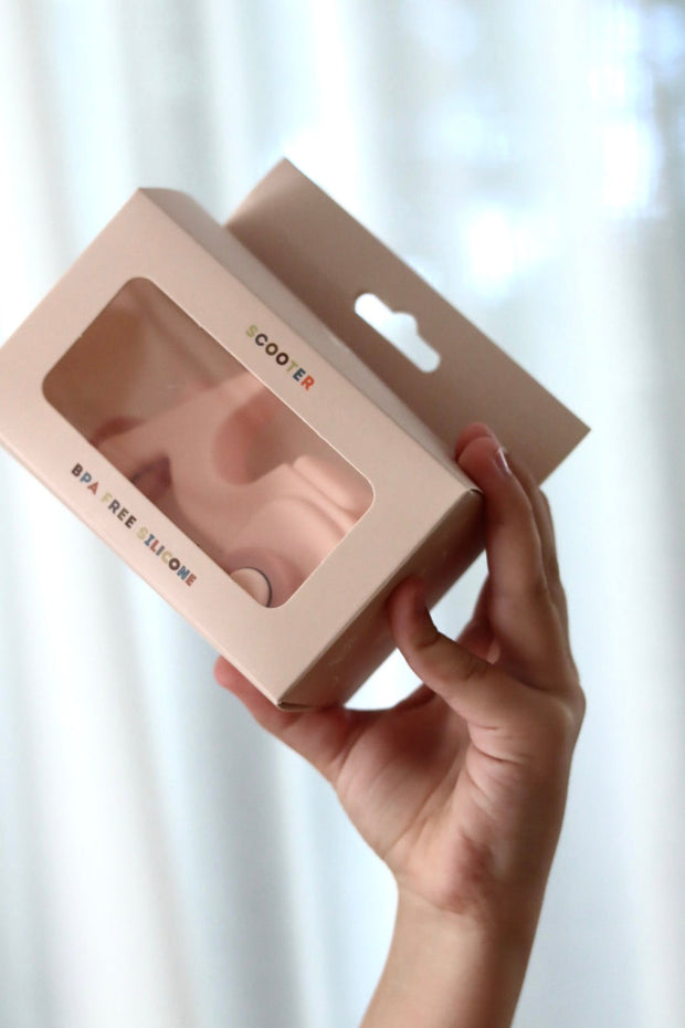 Eco-friendly BPA-free silicone scooter toy in pastel pink