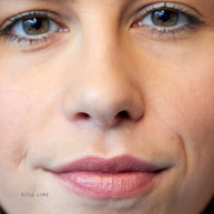 Natural nude lipstick in holiday bon bon packaging with lime and ginger oils