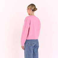 May Cardi pink knitwear styled with denim jeans
