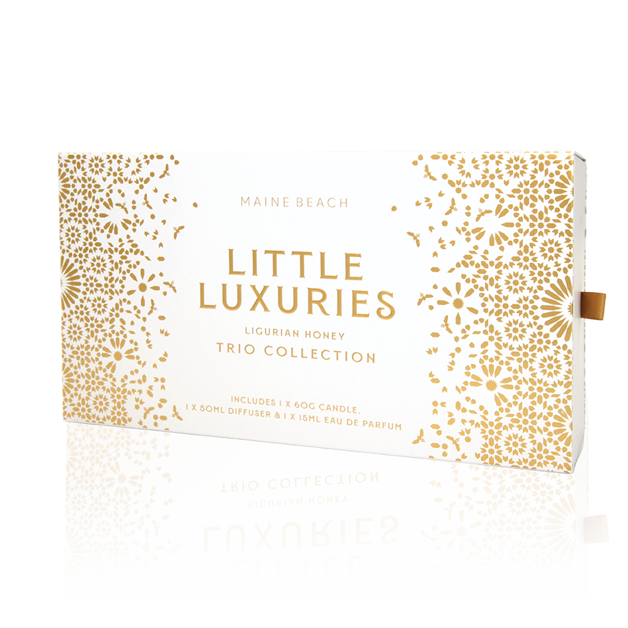 Mini candle, diffuser and perfume in gold packaging