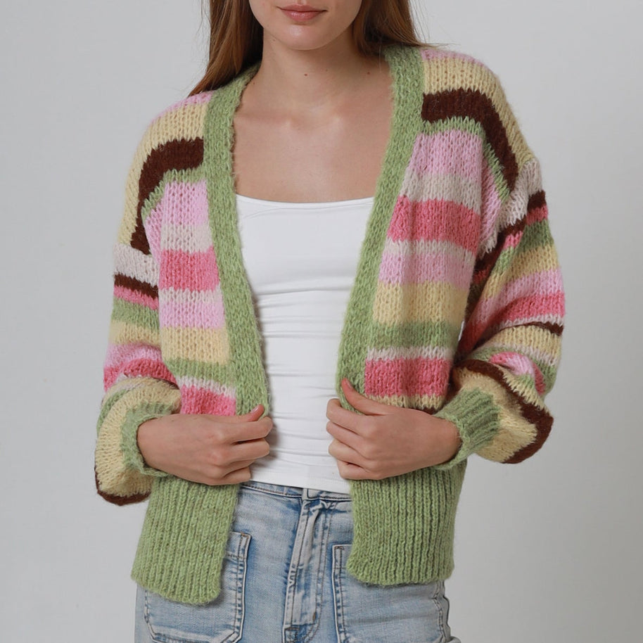 Model wearing rainbow stripe mohair blend cardigan in sage green