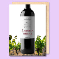 A greeting card with a wine bottle on the front saying 