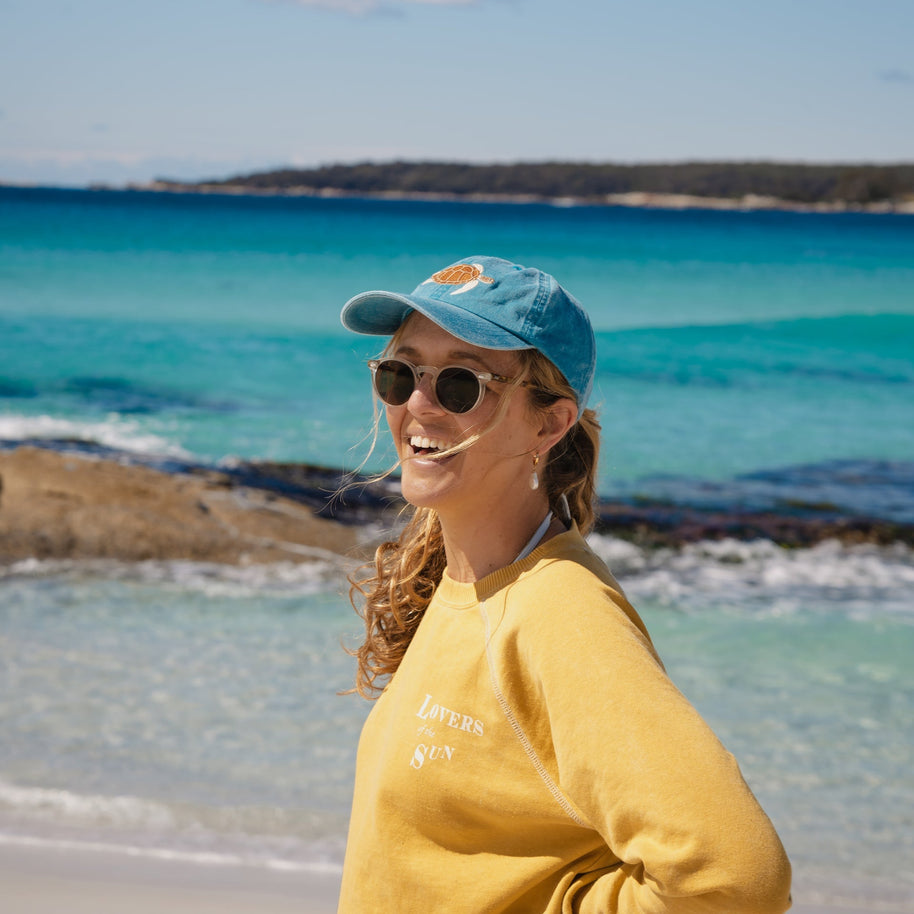 Ocean blue baseball cap with embroidered sea turtle