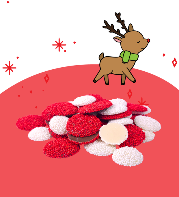 Milk chocolate freckles with colourful sprinkles in fun Christmas packaging