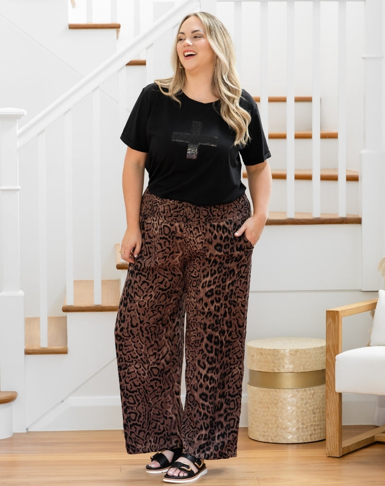 Women’s brown leopard rayon resort pants with flared leg