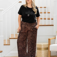 Women’s brown leopard rayon resort pants with flared leg