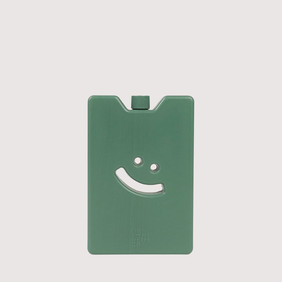 Slim reusable ice pack with embossed smiley design