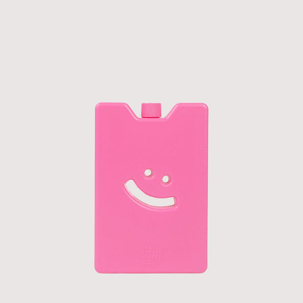 Slim reusable ice pack with embossed smiley design