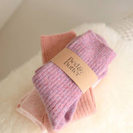 Soft heather rose cosy socks made from responsibly sourced cashmere and recycled fibres