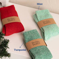 Soft ribbed turquoise teal socks made from cashmere and recycled fibres