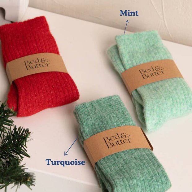 Soft ribbed turquoise teal socks made from cashmere and recycled fibres
