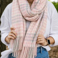 Soft winter-weight check scarf in blush pink grey and cream tones with fringe ends