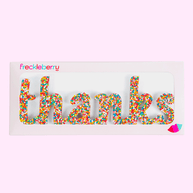 Thanks chocolate word with colourful sprinkles